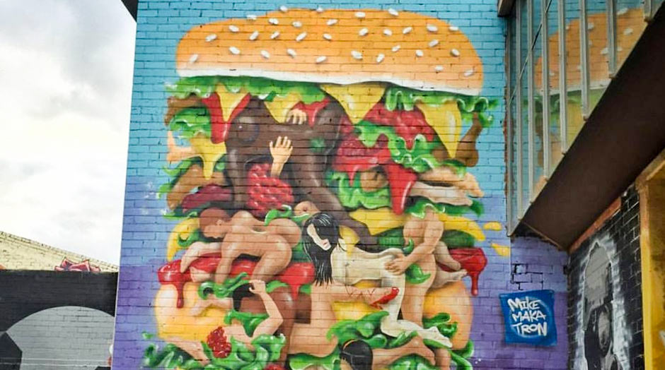 The Kamasutra Burger mural by Mike Makatron celebrates an orgy between lettuce leaves.