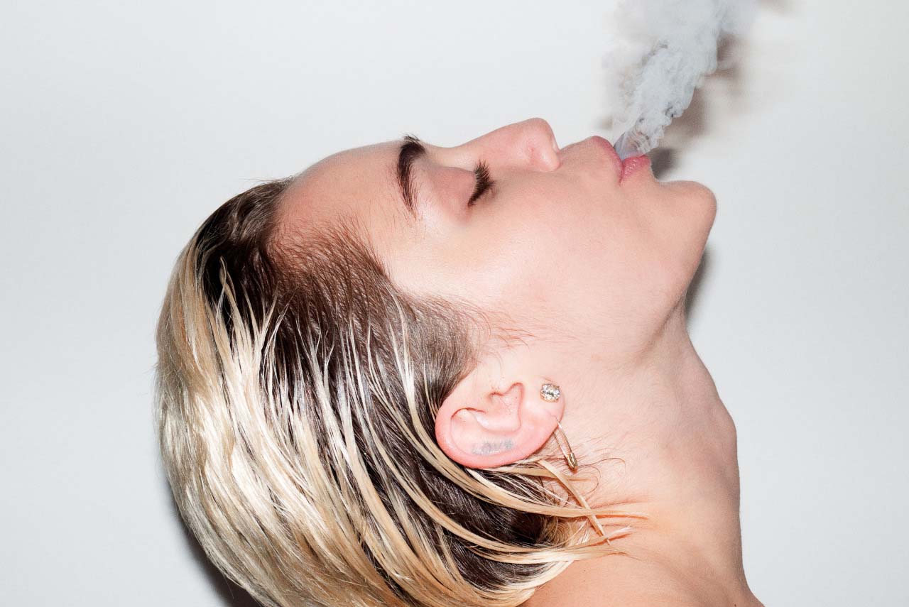 Miley Cyrus nude, smoking and with strap-on by Terry Richardson for Candy magazine. Photo via Terry's diary.