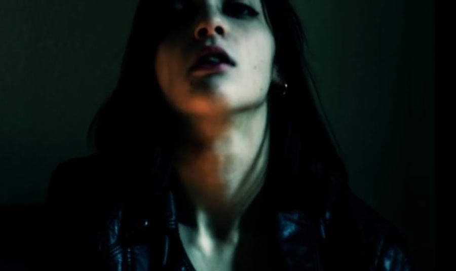 Still from the video Femme Noir by Nico Bertrand featuring Margou Darko.